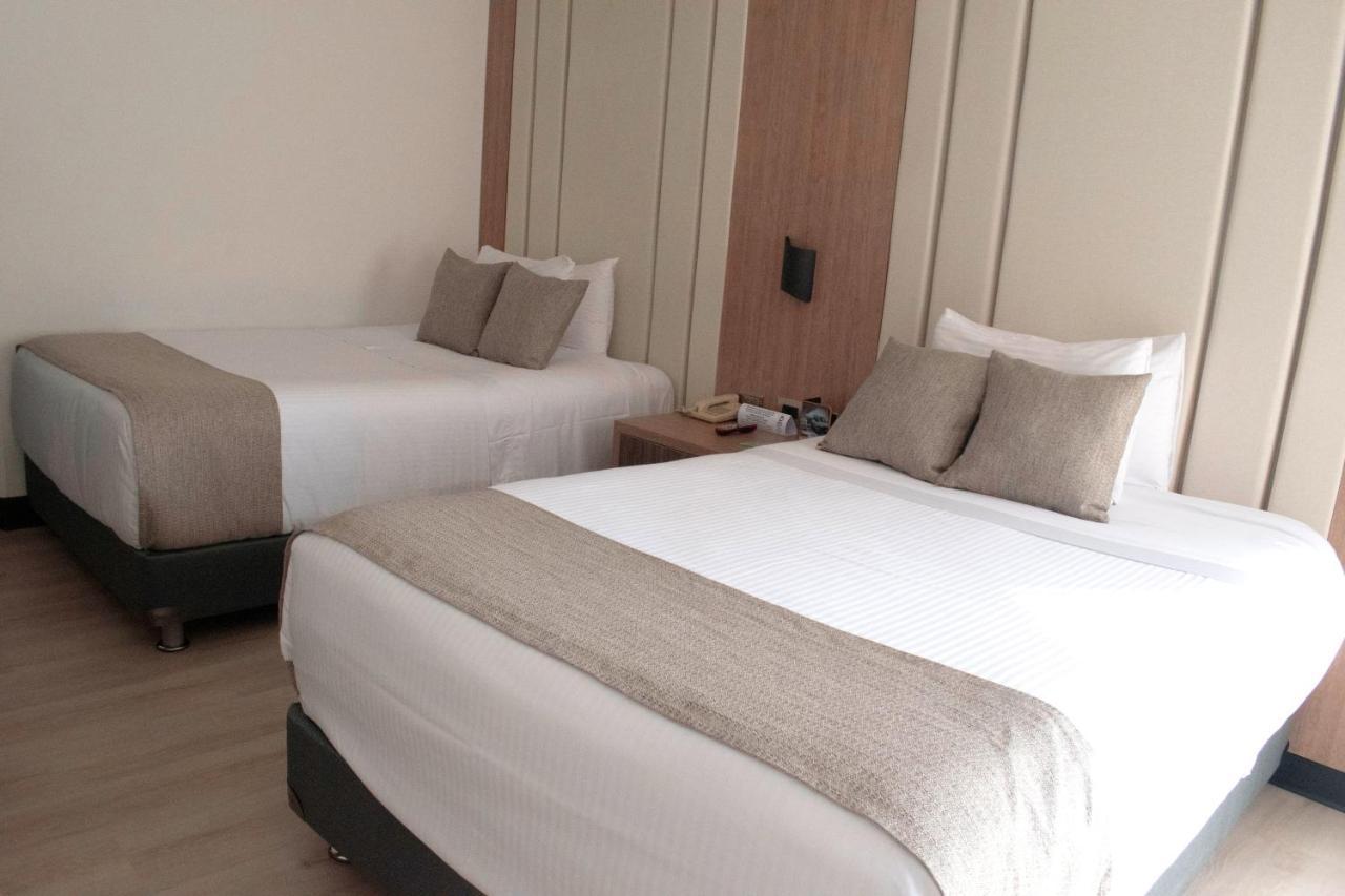 Hotel Dann Carlton Belfort Medellín Exterior foto A room at the hotel